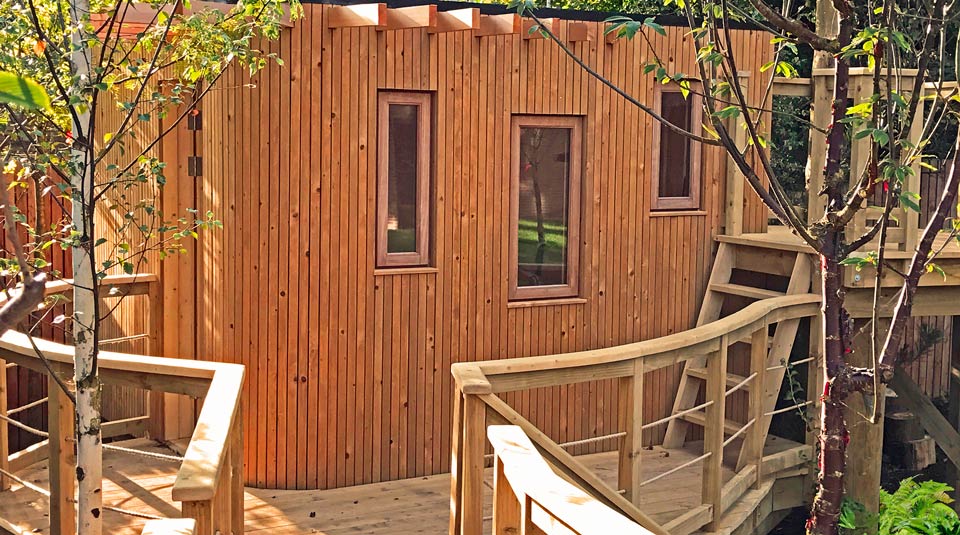 Fine detailed contemporary treehouse & play garden