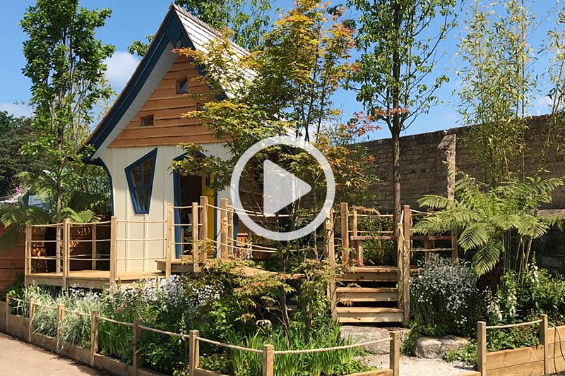 Bespoke luxury treehouse, decks and stream in designed woodland setting.